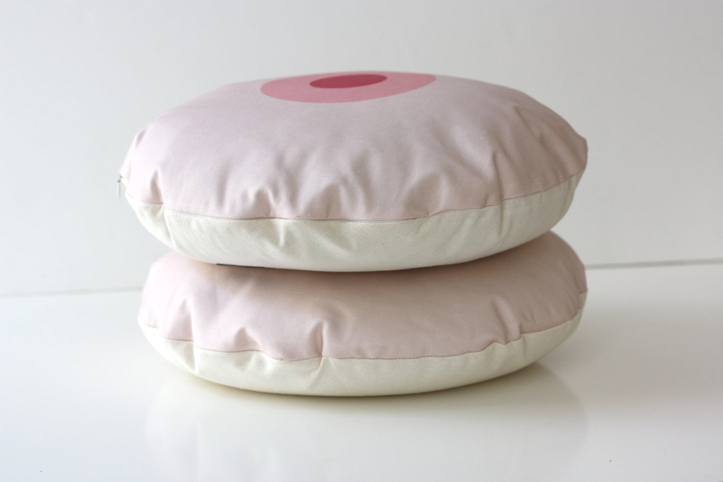OLIVIA round decorative cushion with geometric patterns, made from organic cotton, eco-friendly, for modern home decor.