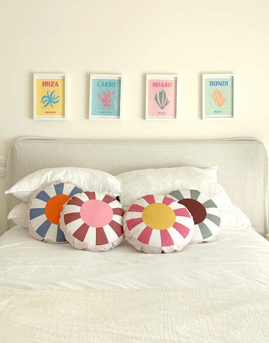 TOM round decorative cushion with vibrant geometric patterns, made from organic cotton, eco-friendly, perfect for kids' rooms and modern home decor.