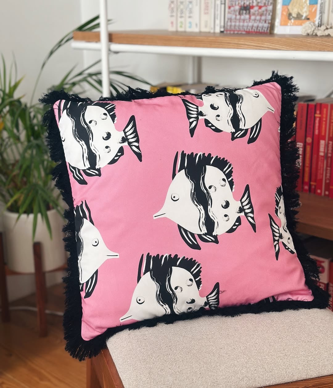 Decorative fun fringed cushion for children bedroom decor with pink fish print