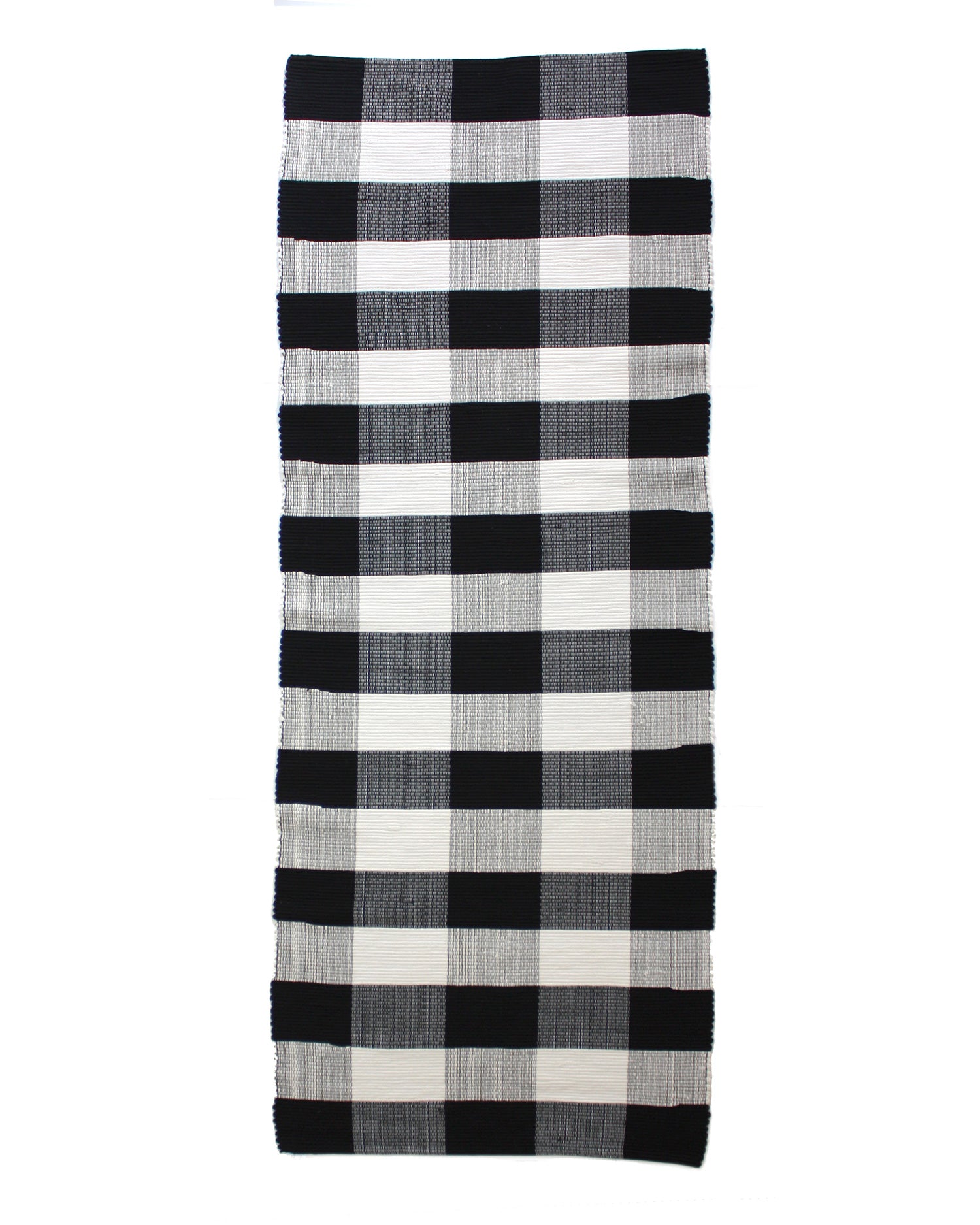 handwoven rug in checkered pattern