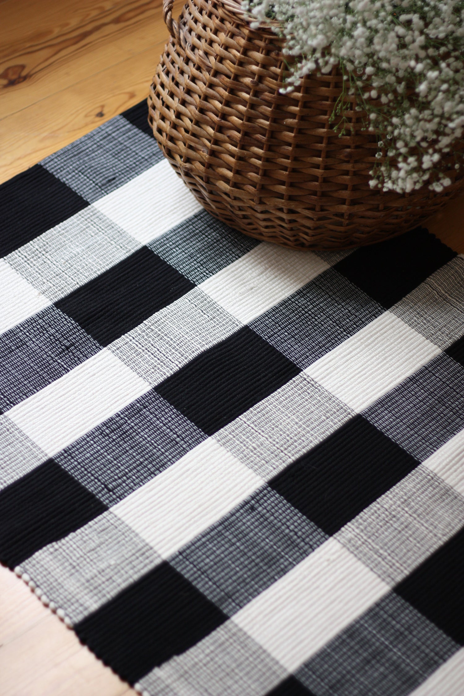 handwoven rug in checkered pattern