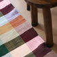 OVE handwoven rug with colorful checkered pattern by My Friend Paco