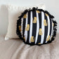 fat cat round cushion with fringes, yellow cat + black and white stripes.